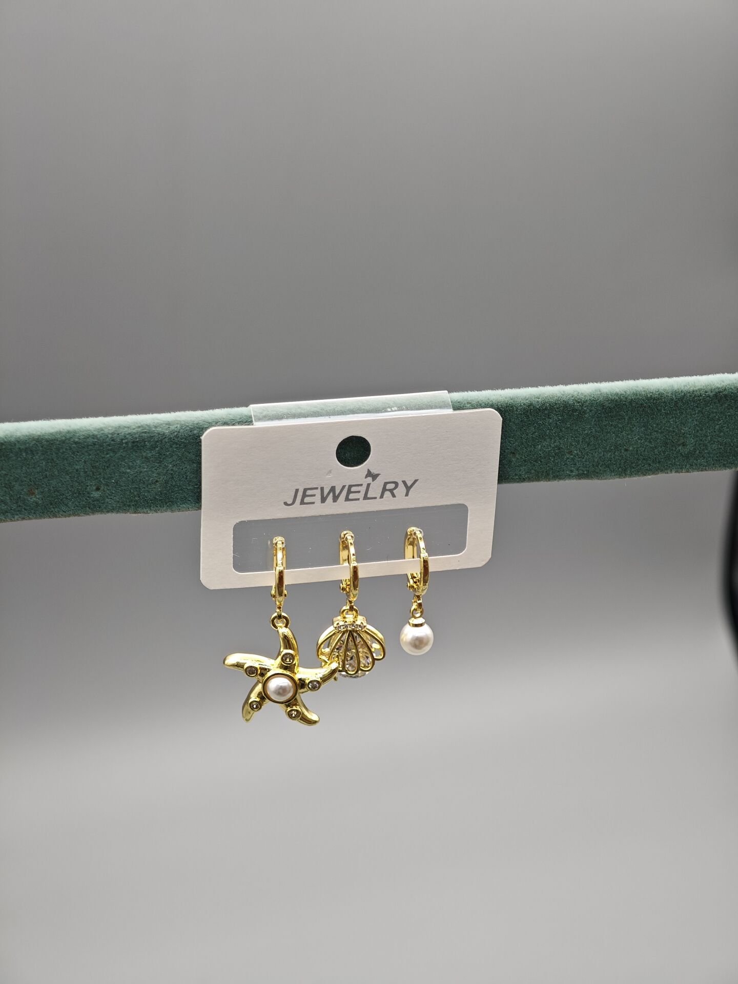 Üçlü Çelik Küpe Seti – Deniz Yıldızı, İstiridye ve İnci Detaylı Modern Kadın Küpe Kombini, Günlük ve Özel Kullanım İçin